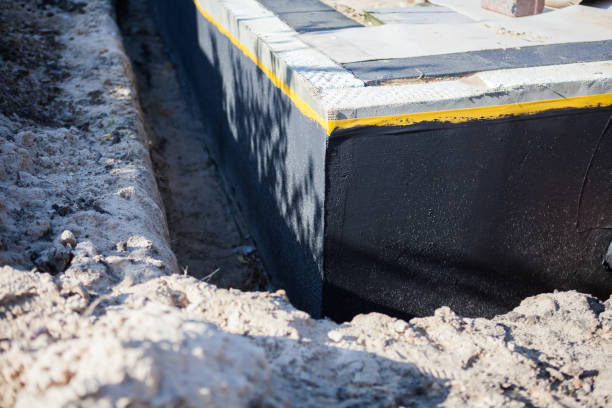 Professional Waterproofing technician working in Fremont, WI